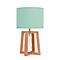 Tafellamp met turquoise lampenkap en houten voet.
