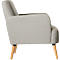 Side view of a light gray armchair with wooden legs.