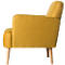 Yellow armchair in profile. Light yellow fabric cover, wooden legs. Cozy design.