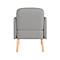 Grijze fauteuil van achteren, met lichte houten poten, tegen een witte achtergrond.