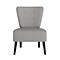 Fauteuil gris sur fond blanc, avec pieds sombres et boutons sur le dossier.
