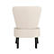 Fauteuil crème, vu de dos. Assise rectangulaire, dossier semi-circulaire, pieds noirs.