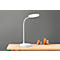 Witte bureaulamp op houten tafel, grijze achtergrond. Houten figuren ernaast.