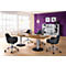 Conference table with black chairs, in a modern office. The background is partially purple.