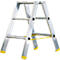 A silver stepladder stands on yellow feet. A yellow bar connects the legs.