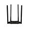 Rückseite eines schwarzen WLAN-Routers mit vier Antennen und drei LAN-WAN-Anschlüssen.