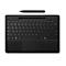 Clavier noir avec stylet, vue de dessus. Le clavier a un pavé tactile et le stylet est au-dessus.