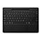 Draufsicht einer schwarzen, schlanken Tastatur mit Trackpad und einer Aussparung für einen Stift oberhalb der Tasten.