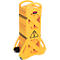 Yellow barrier with wheels and handle. Warning triangle with exclamation mark. Black tension straps hold the construction together.