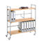 Rolling cart with three levels, filled with binders and some books.