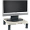 Monitor on a gray stand. The display is black, the frame silver. The stand has four dark legs.