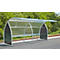 A transparent bus stop shelter with metal frame. The stop offers protection from rain.