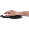 Hand on an ergonomic mouse with wrist rest. Black rest, white mouse, fair skin.