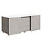 Modern sideboard with grey textured body and white top, three drawers. Interior design.