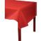 Chemin de table rouge sur une table à pieds en bois. Le coin supérieur gauche du chemin de table est visible.