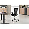 Black office chair in modern office. The chair has a mesh back, armrests and a silver base.