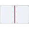 Open grid notebook with a red spiral binding.
