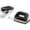 A black and white stapler and a black and white hole puncher lie side by side.