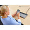 A woman in a blue shirt sits at a table using a calculator and a small keyboard. The Bakker Elkhuizen logo is visible in the background.
