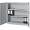 Gray filing cabinet with open door, three shelves, file folders, and notebook.