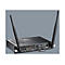 Schwarzer Mini-PC mit zwei Antennen auf grauem Hintergrund. Anschlüsse: USB, HDMI, Audio und LAN.
