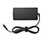 Adaptateur secteur pour ordinateur portable noir avec câble. Boîtier rectangulaire avec câble connecté, bouclé et fixé avec du velcro. Prise à gauche.