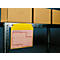 Yellow document holder with paper on a metal shelf, behind cardboard boxes. Text on the paper: Inland Expeditions A/S.