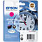 A magenta Epson ink cartridge with a clockwork in the background. Product information and the Epson logo are shown on the packaging.