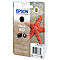 Black Epson 603 ink cartridge next to a starfish on sand.