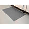 Gray mat in front of a machine on white floor. Black cable and machine parts visible.
