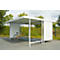 Bicycle shelter with bicycle, light gray and white. Covered, with green and asphalt in the background.