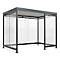 Grey bus shelter with glass walls and roof.