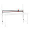 White workbench with a red cutting tool.