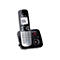 Schnurloses Telefon von Panasonic auf Ladestation. Display zeigt Nummer an.
