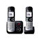 Zwei silber-schwarze Panasonic DECT-Telefone mit Basisstation vor weißem Hintergrund.