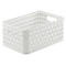Panier de rangement rectangulaire blanc avec texture tissée et ouvertures pour poignées sur les côtés courts.