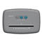 Grey paper shredder with control buttons. The text "OneShred 12CC" is on top.