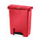 Red trash can with lid and foot pedal. There is a small lettering on the lid.