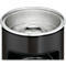 Close-up of a black container with a silver interior and rim.