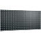 Black metal plate with square holes.