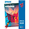 Epson photo paper packaging. Red box with ribbon and tissue paper. Blue side with product description, text: Photo Quality.