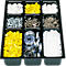 Black tray with nine compartments filled with various small parts: screws, springs, yellow caps.
