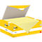 Gele Post-it notes in een gele doos, deksel open.