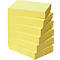 A stack of yellow sticky notes set at an angle.