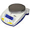 A digital lab scale with a round measuring field, display, and control elements. The display shows 0.0 g.
