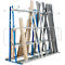 A blue and silver rack filled with wooden and metal poles of different sizes and colors.
