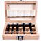 Boîte en bois avec six mèches Forstner de différentes tailles. Marquages numériques de 15 à 35.