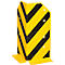 Protection d'angle jaune et noire avec rayures diagonales, trous et pieds de fixation.