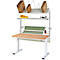 Verstelbare inpaktabel met houten blad, dozen, verpakkingsmaterialen en gele bakken.