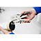 Person staples a cardboard cylinder with a silver stapler. The stapler says 'regus 31'.
